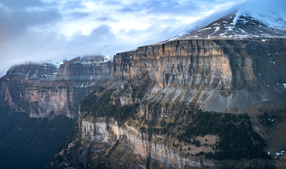 a view of a mountain with snow on it