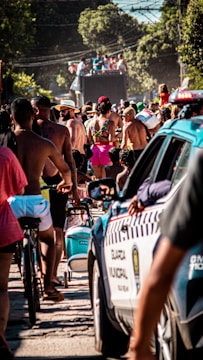 a group of people riding bikes down a street