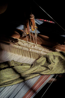 a close up of an old weaving machine