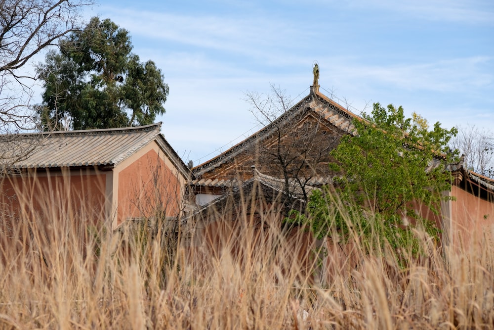 an old building with a cross on top of it