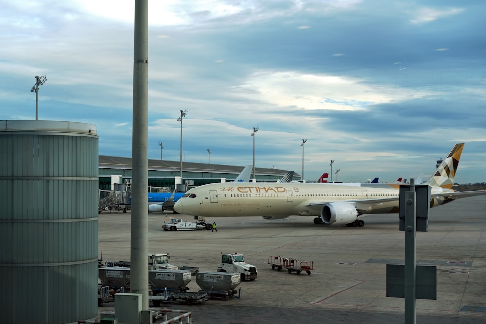 a large jetliner sitting on top of an airport tarmac