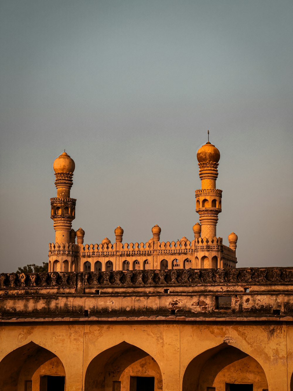 a large building with two towers on top of it