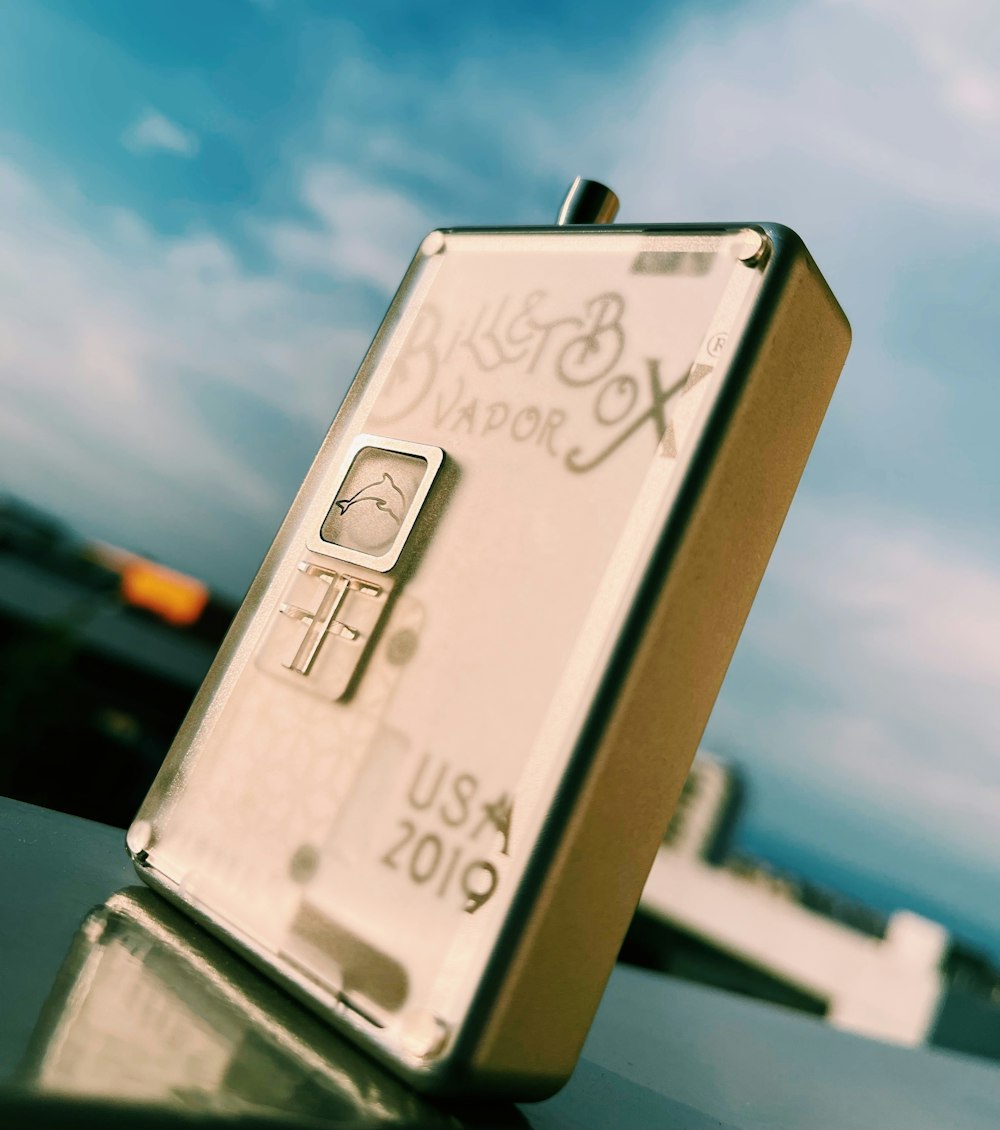 a close up of a cell phone on a table