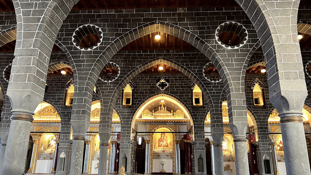 a church with arches and a clock on the wall