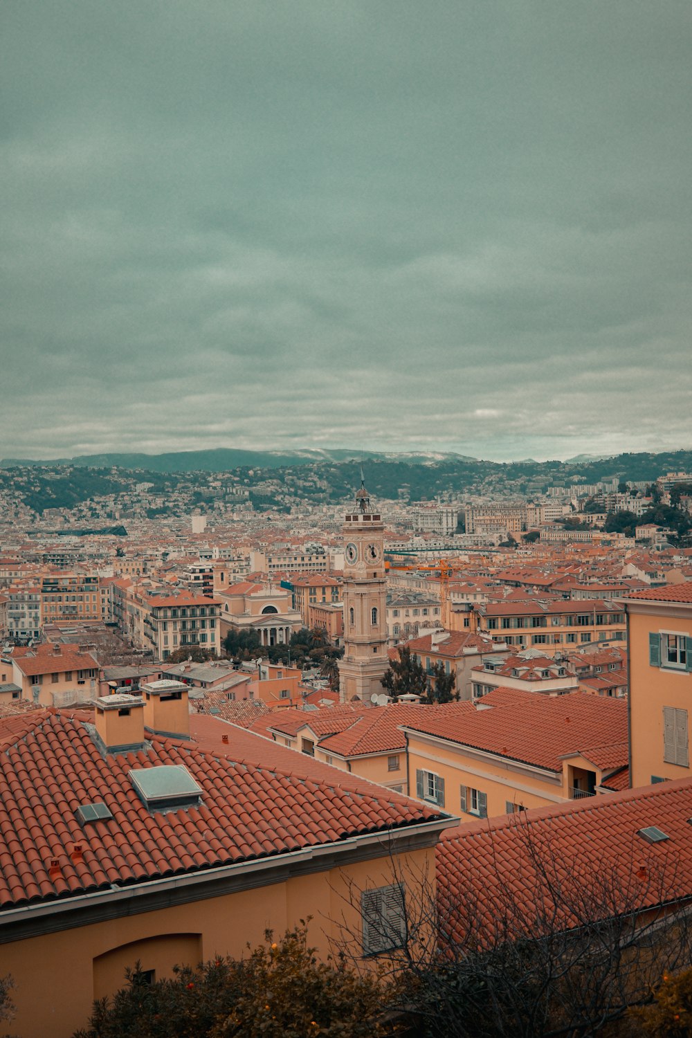 a view of a city from the top of a hill