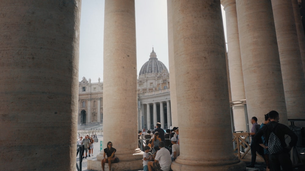 a group of people standing in front of a building