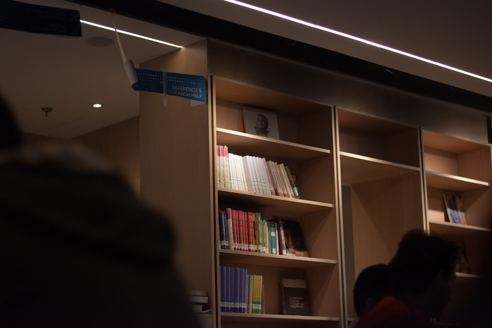 a blurry photo of a bookshelf in a library