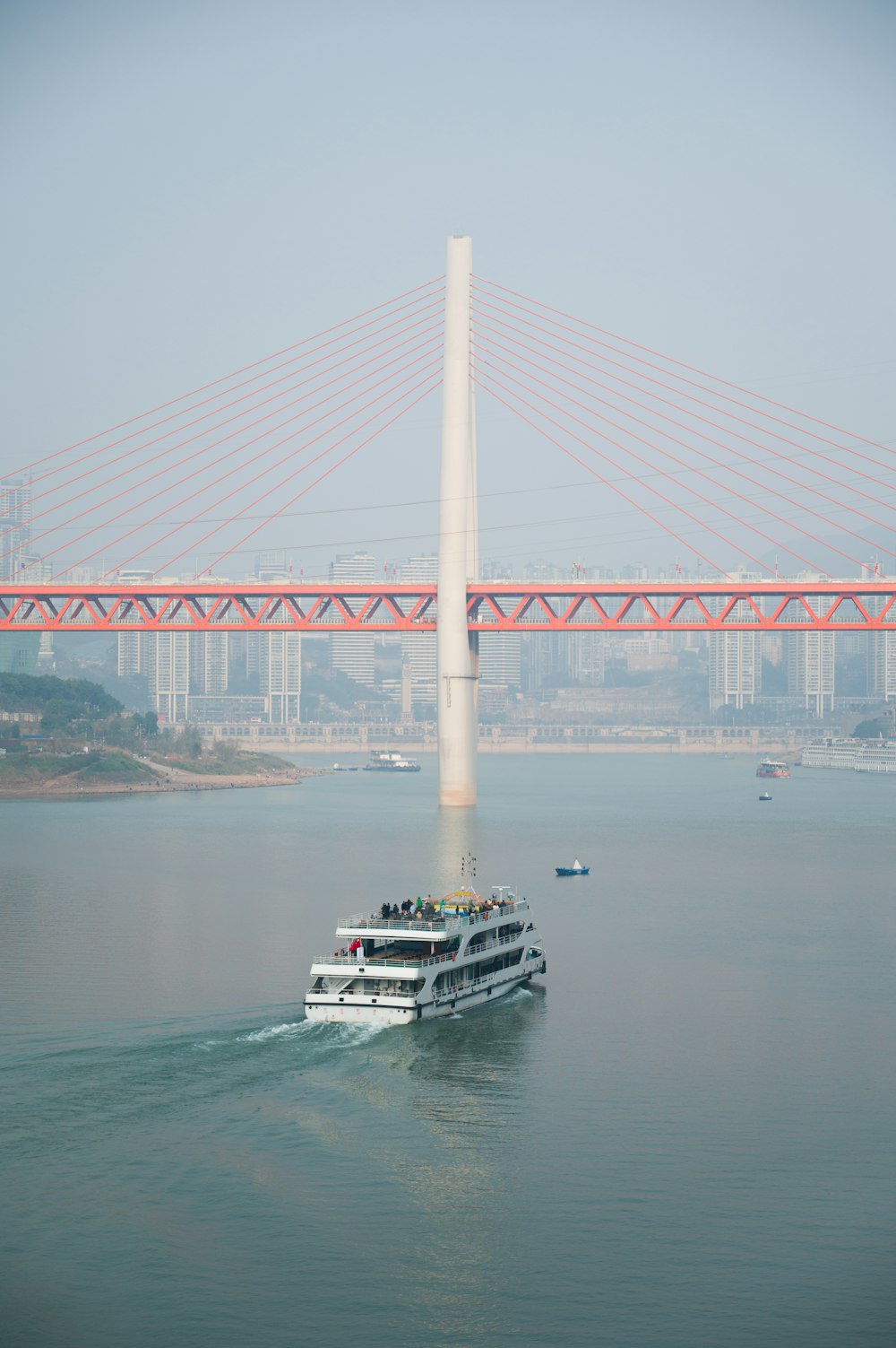 a large boat traveling across a large body of water