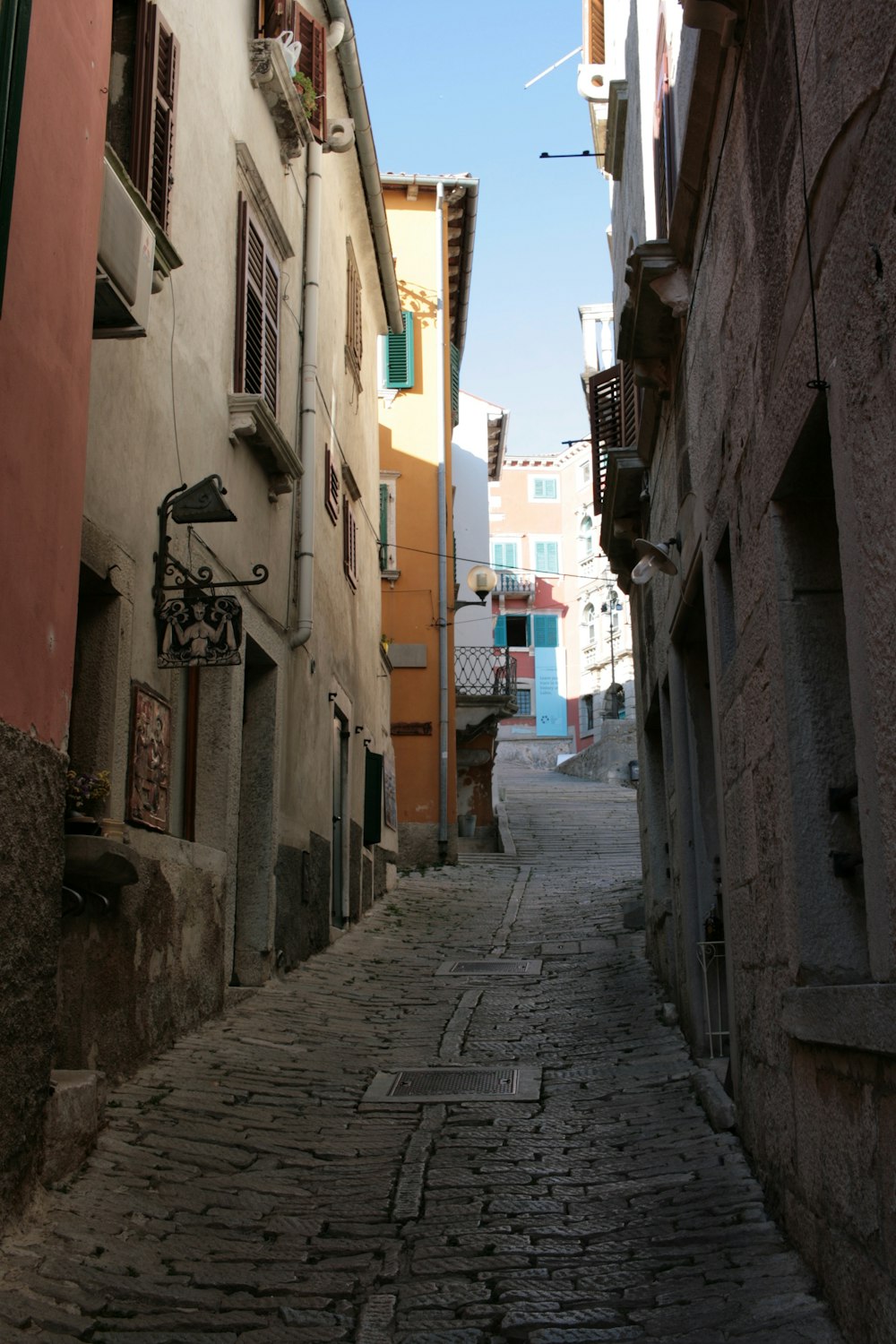 a cobblestone street in a small town