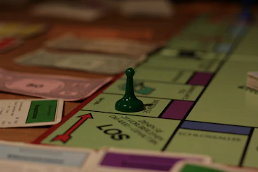 a close up of a monopoly board game