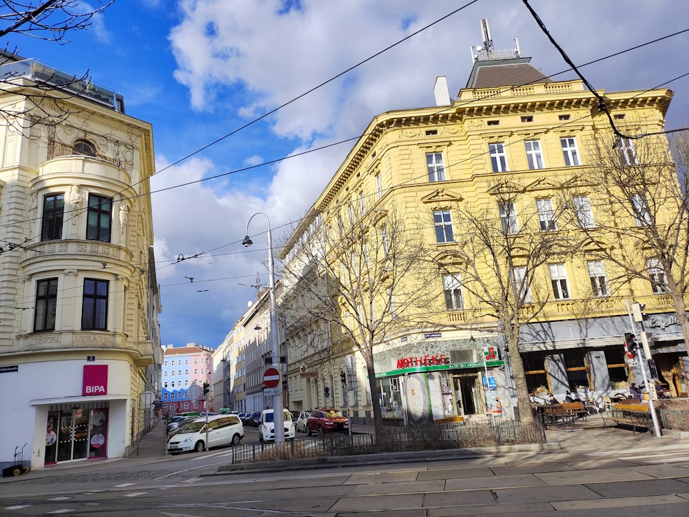 a city street with cars parked on the side of it