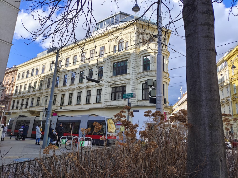 a bus is parked in front of a building