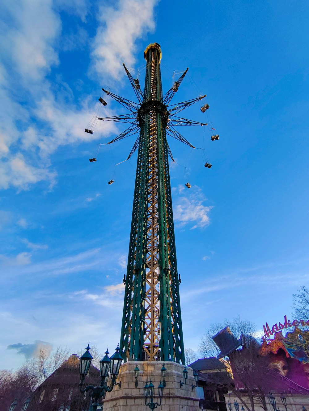 a very tall tower with a sky background