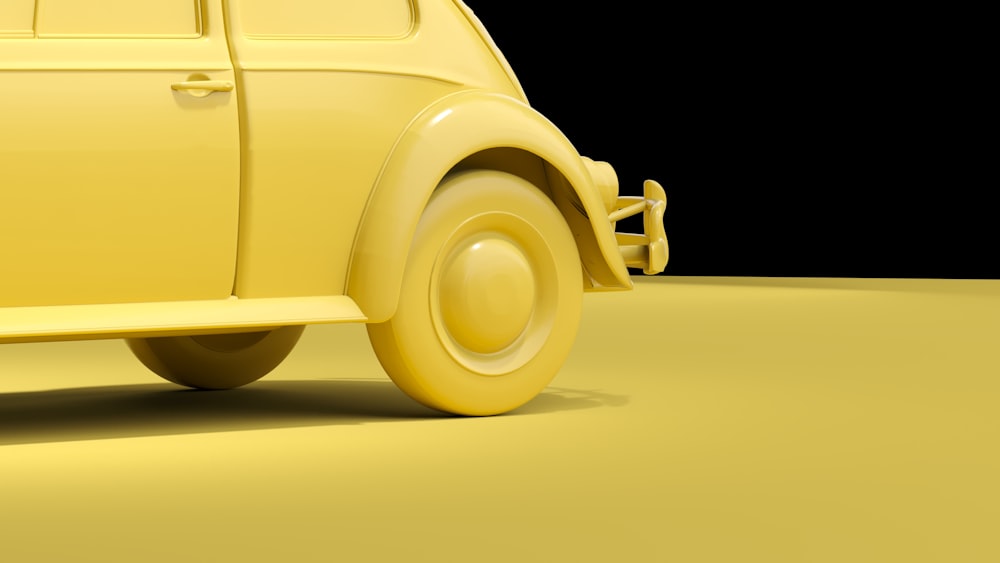 a yellow car is shown on a black background