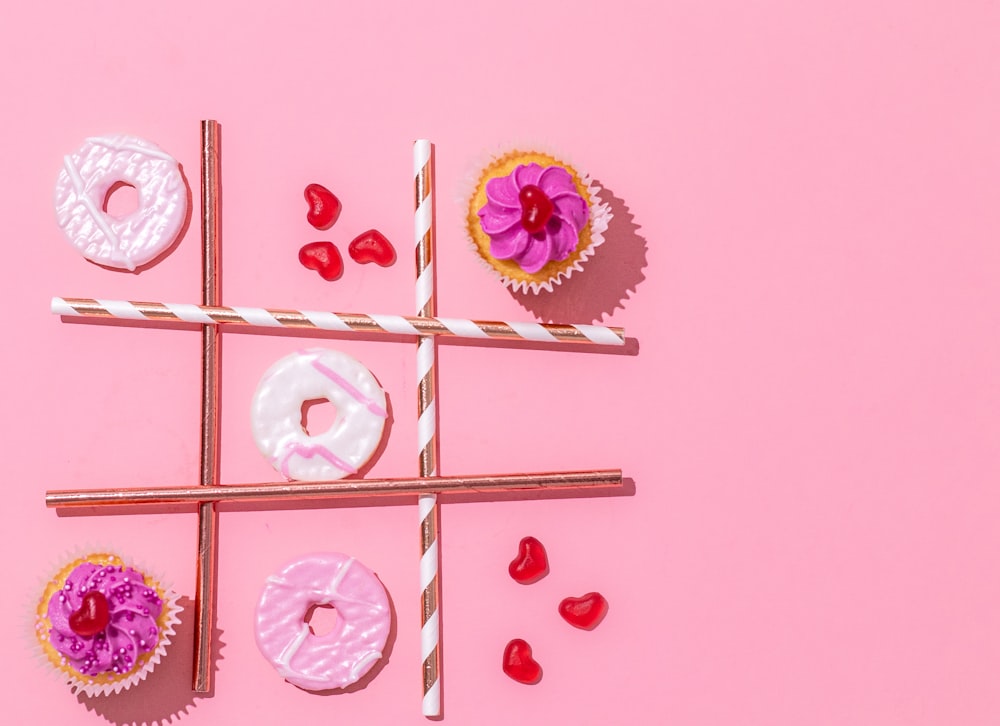 a tic - tac - toe game made out of doughnuts and