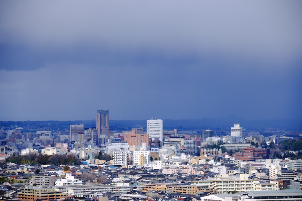 a view of a city with tall buildings