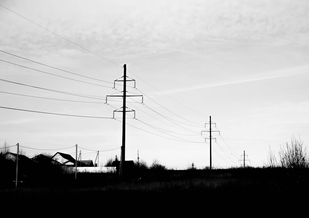 a black and white photo of power lines