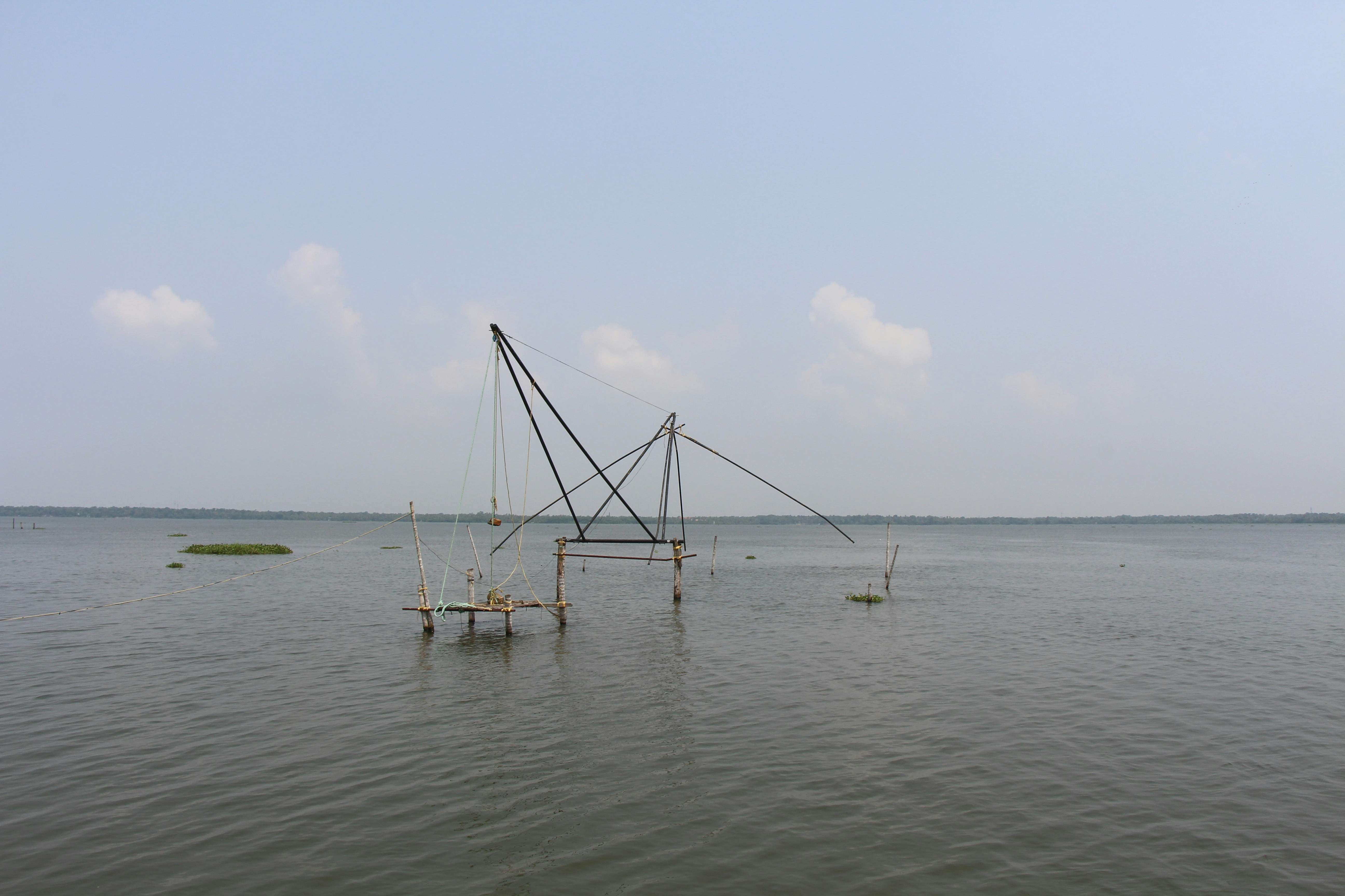 a boat sitting on top of a large body of water