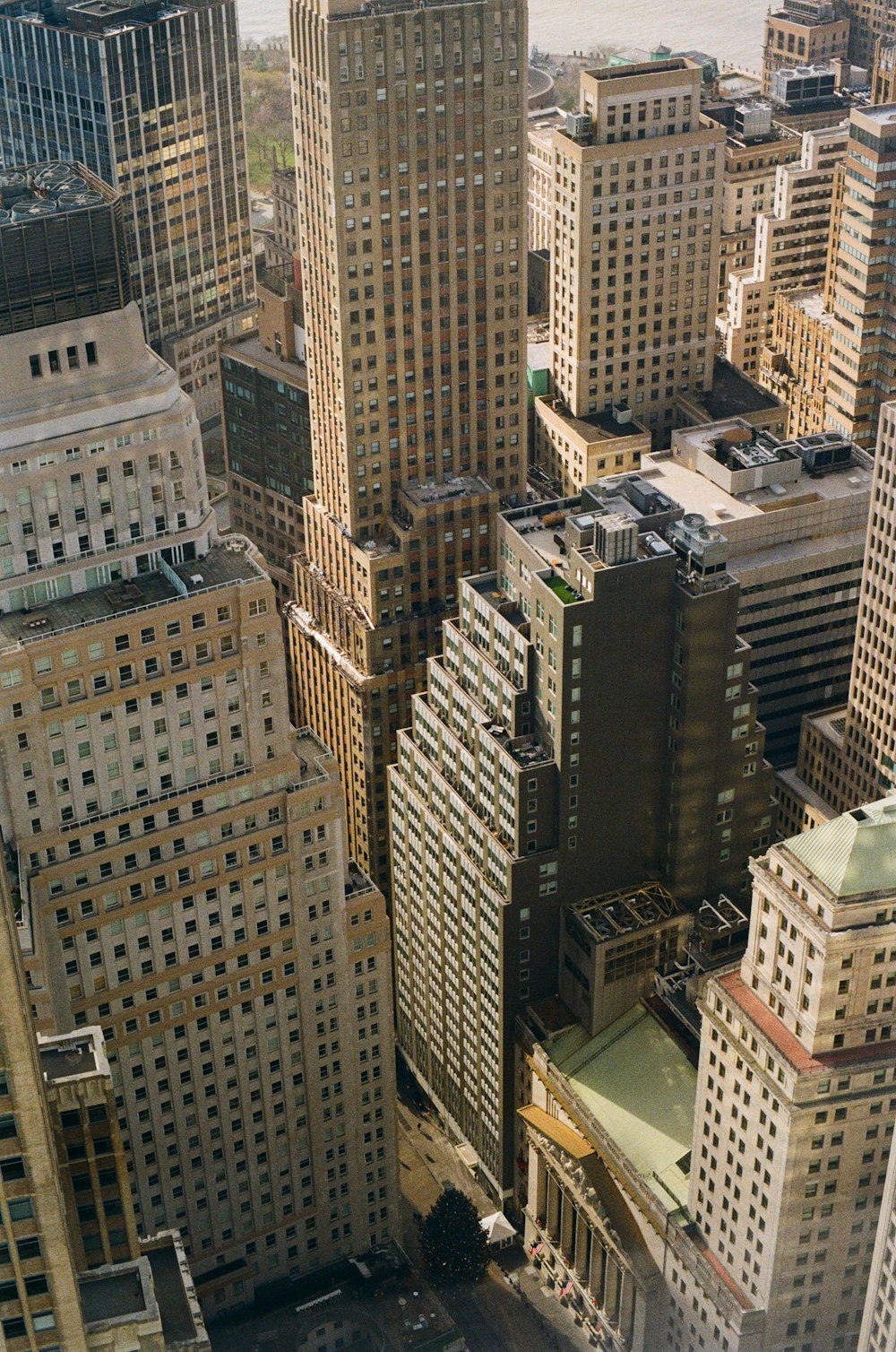 an aerial view of a city with tall buildings