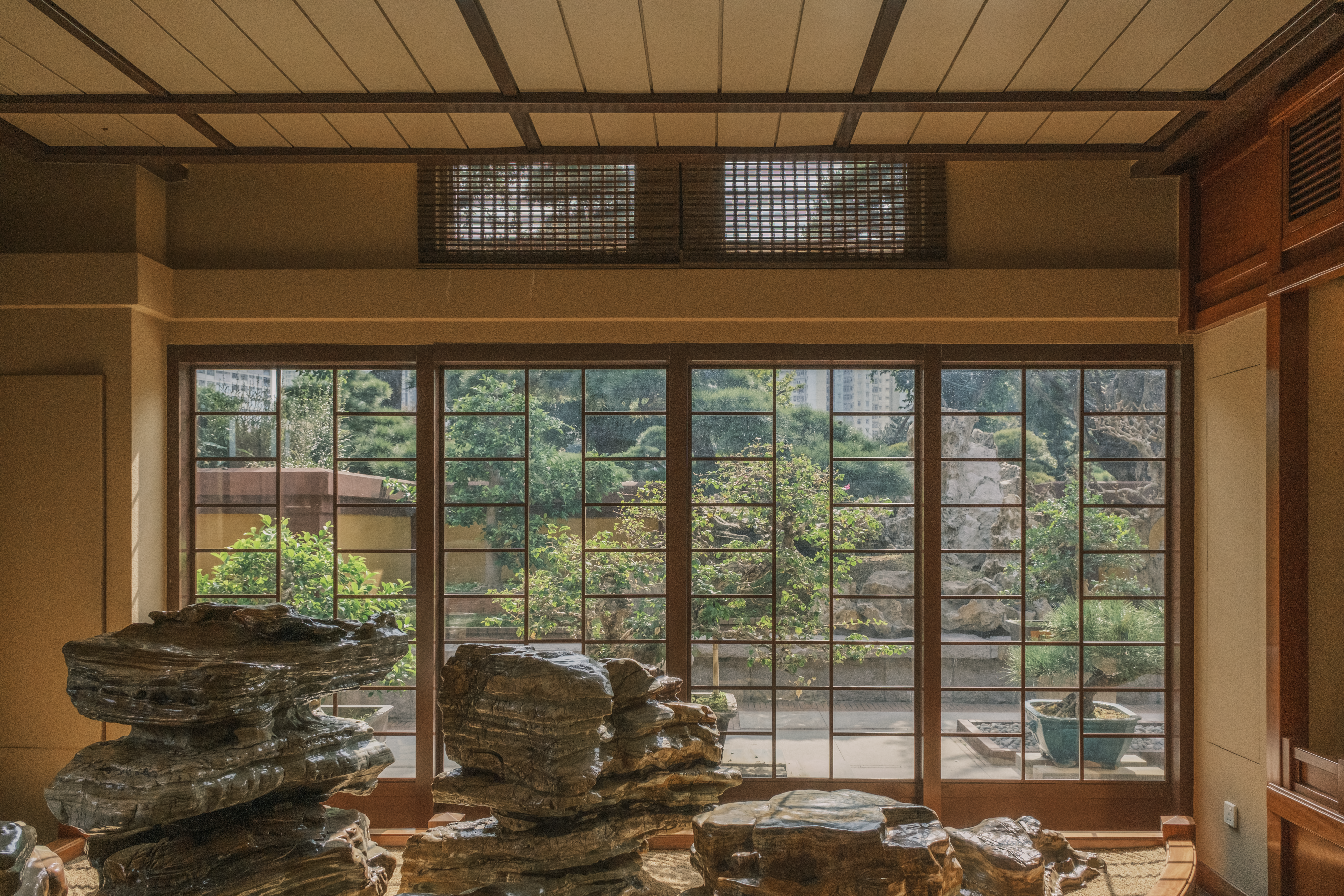 A room filled with stacks of rocks and windows photo – Free Building ...