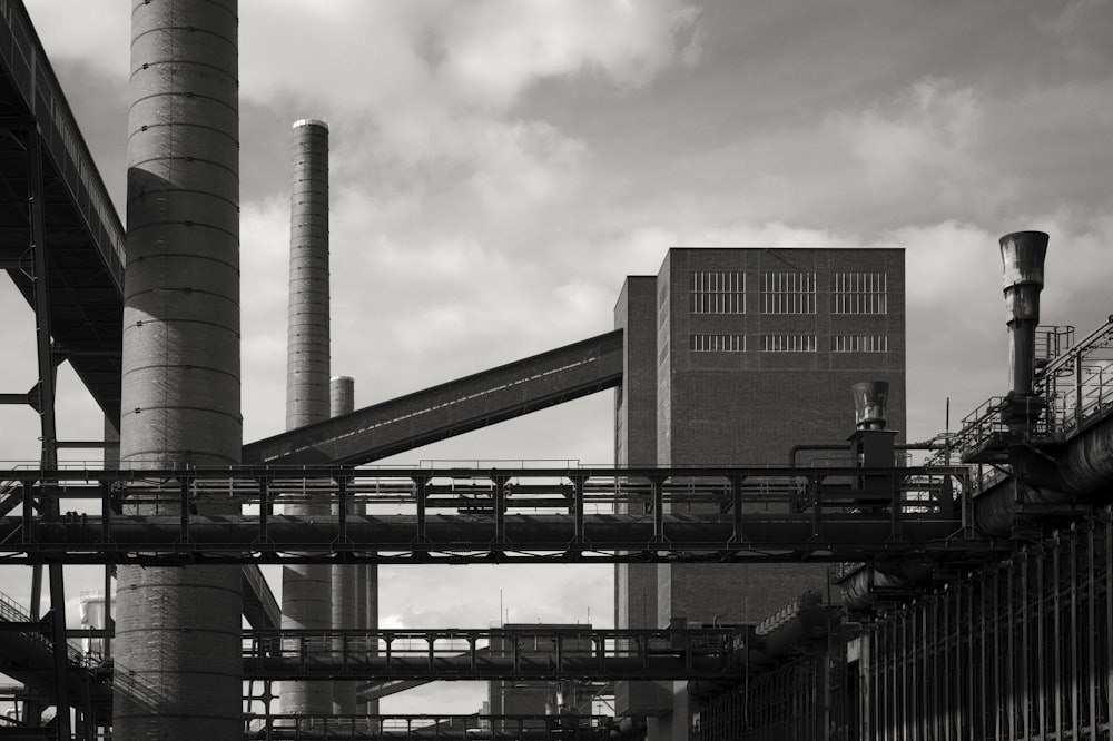 a black and white photo of a factory