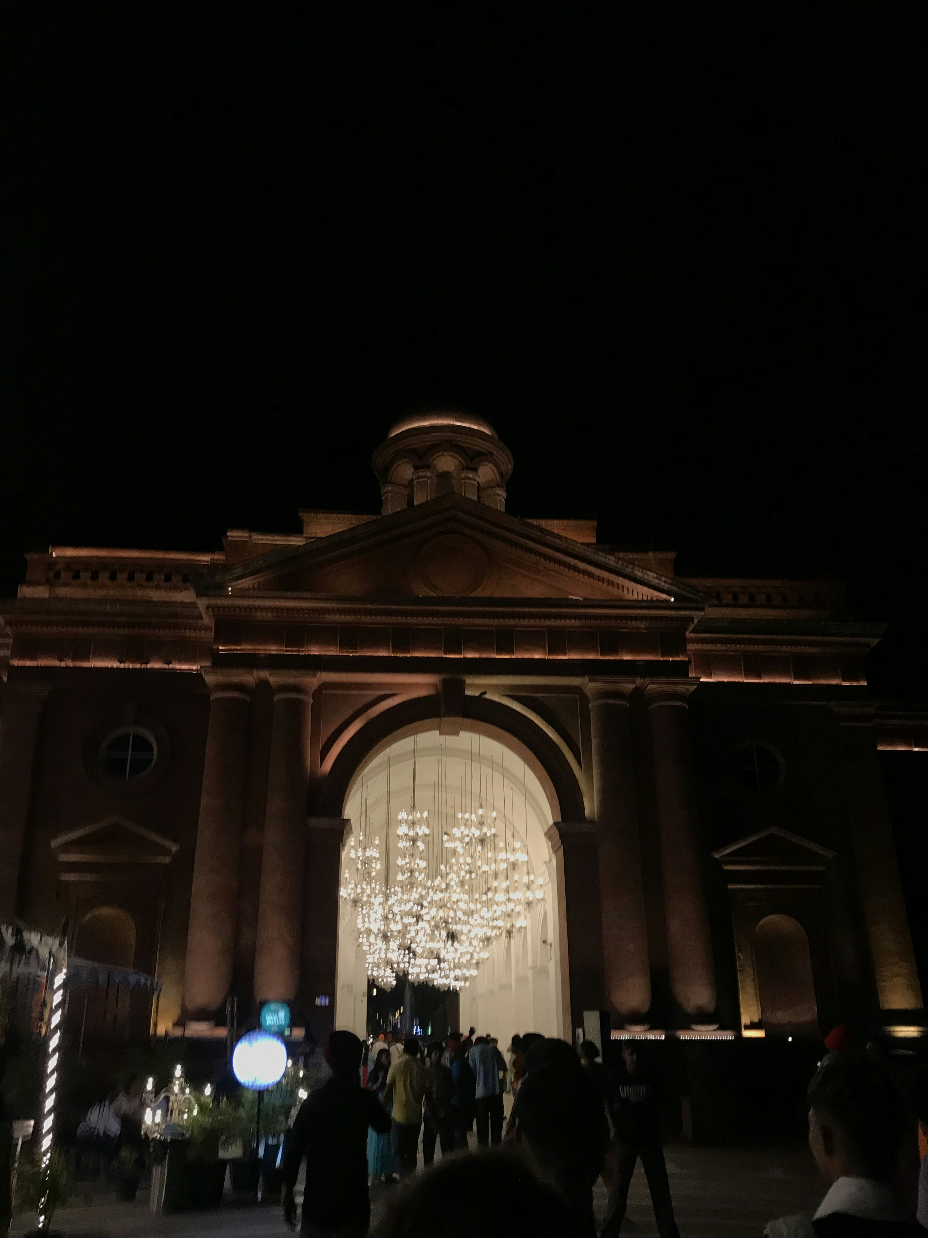 a group of people standing in front of a building