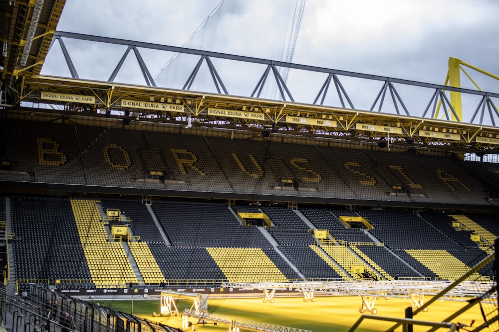 a stadium filled with lots of yellow seats