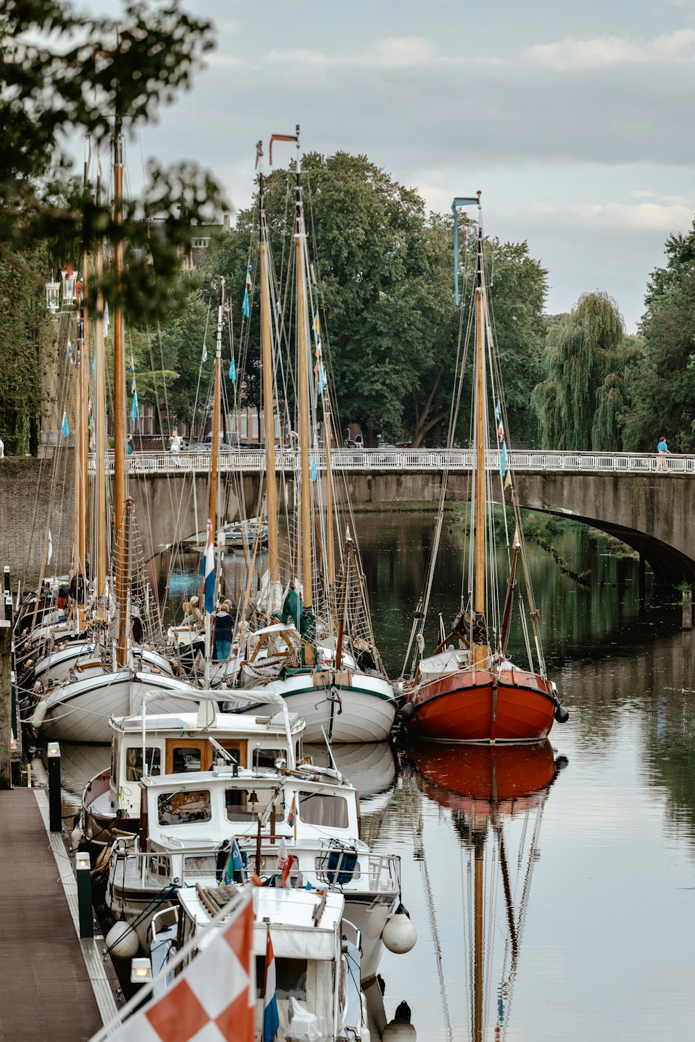 a bunch of boats that are sitting in the water