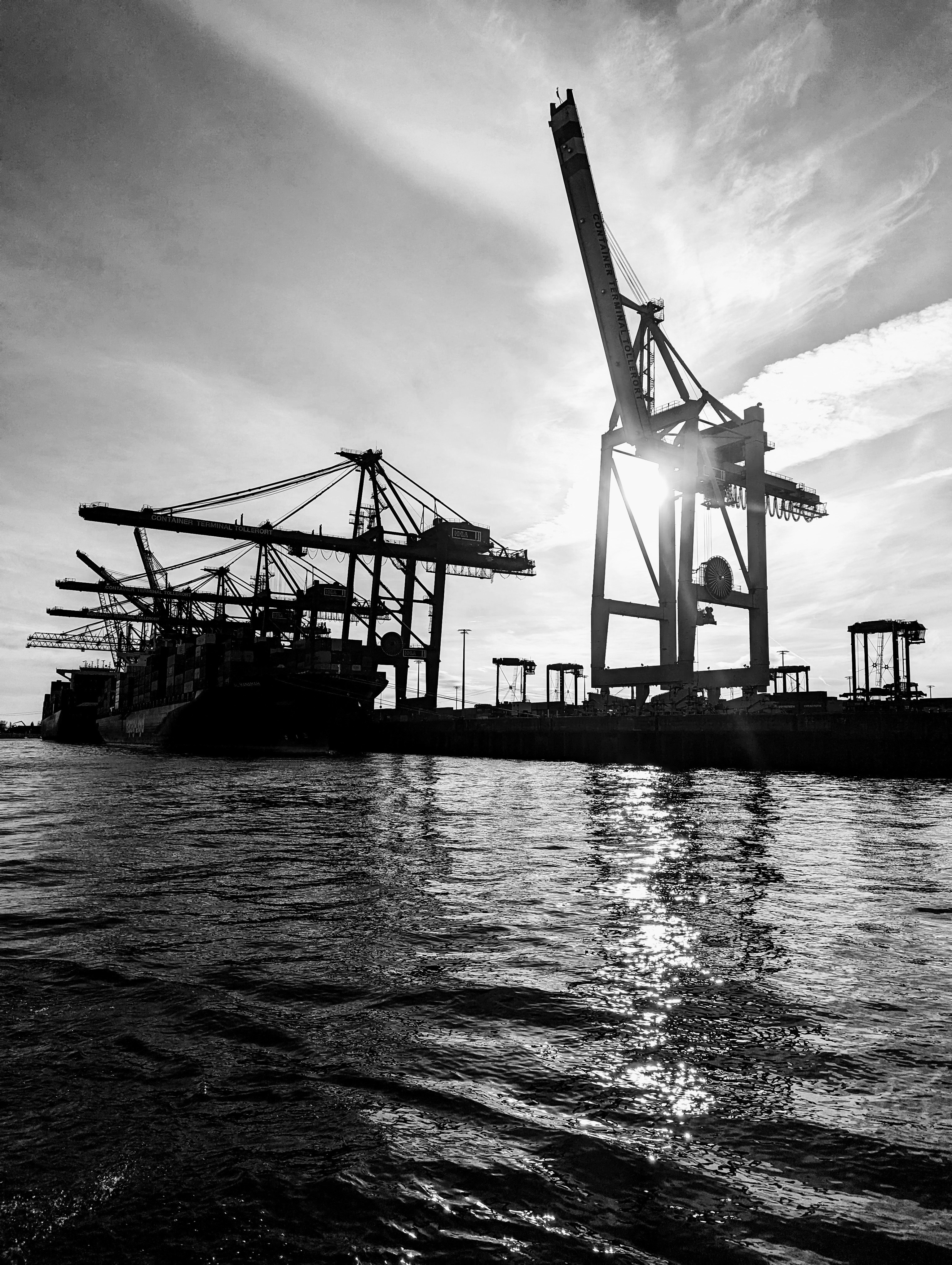 a black and white photo of a boat in the water