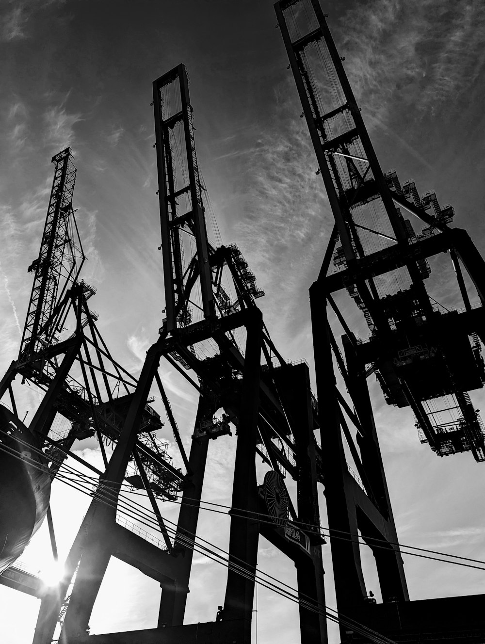 a black and white photo of power lines