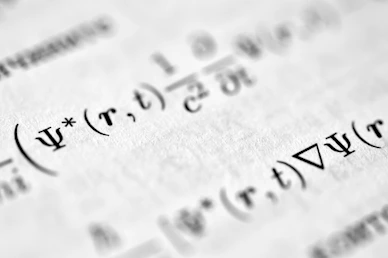 a close up of a piece of paper with writing on it