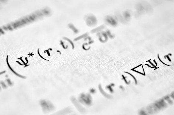 a close up of a piece of paper with writing on it