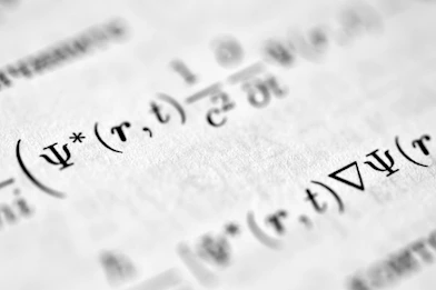 a close up of a piece of paper with writing on it