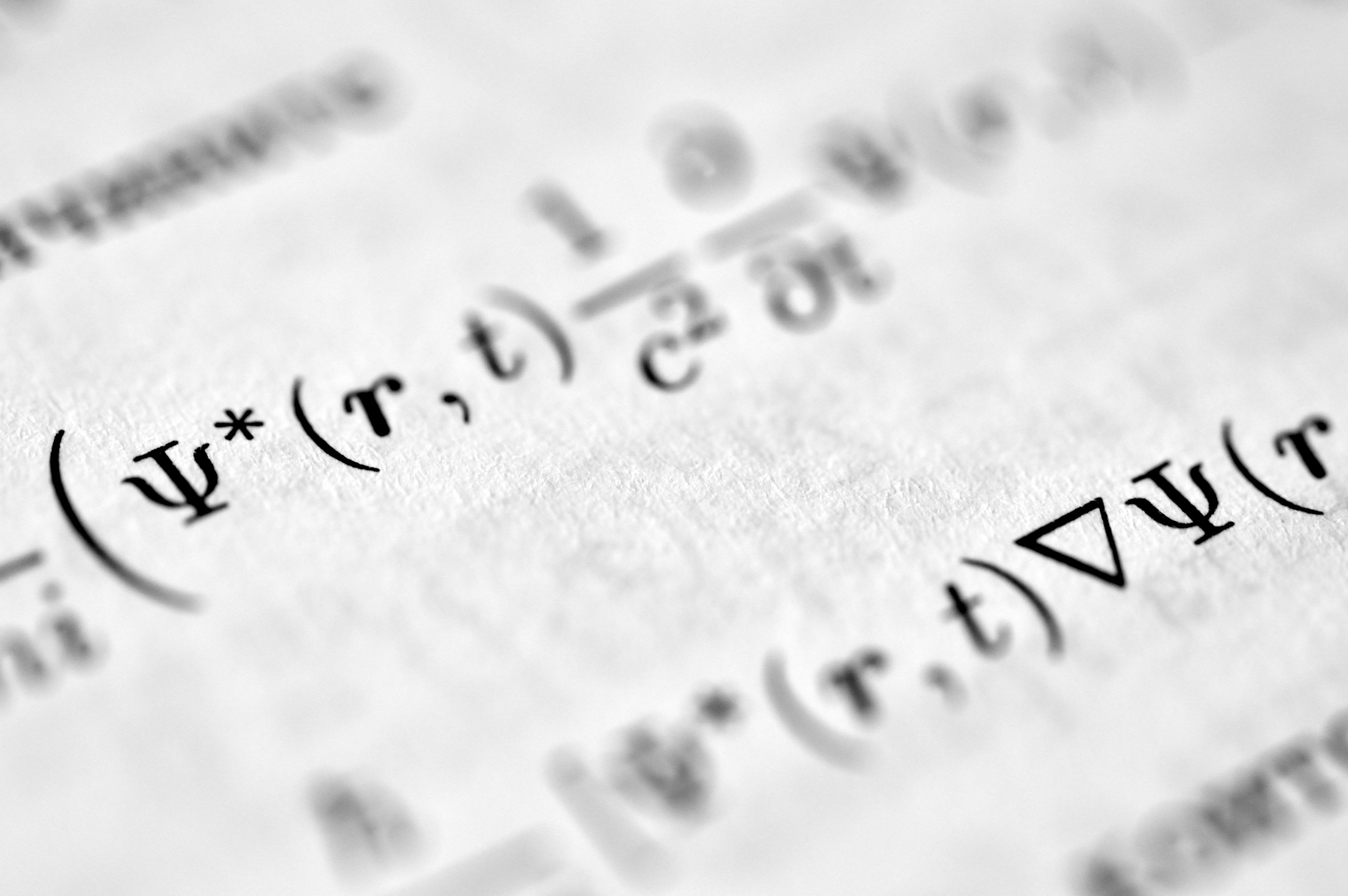 Close up of printed scientific equation