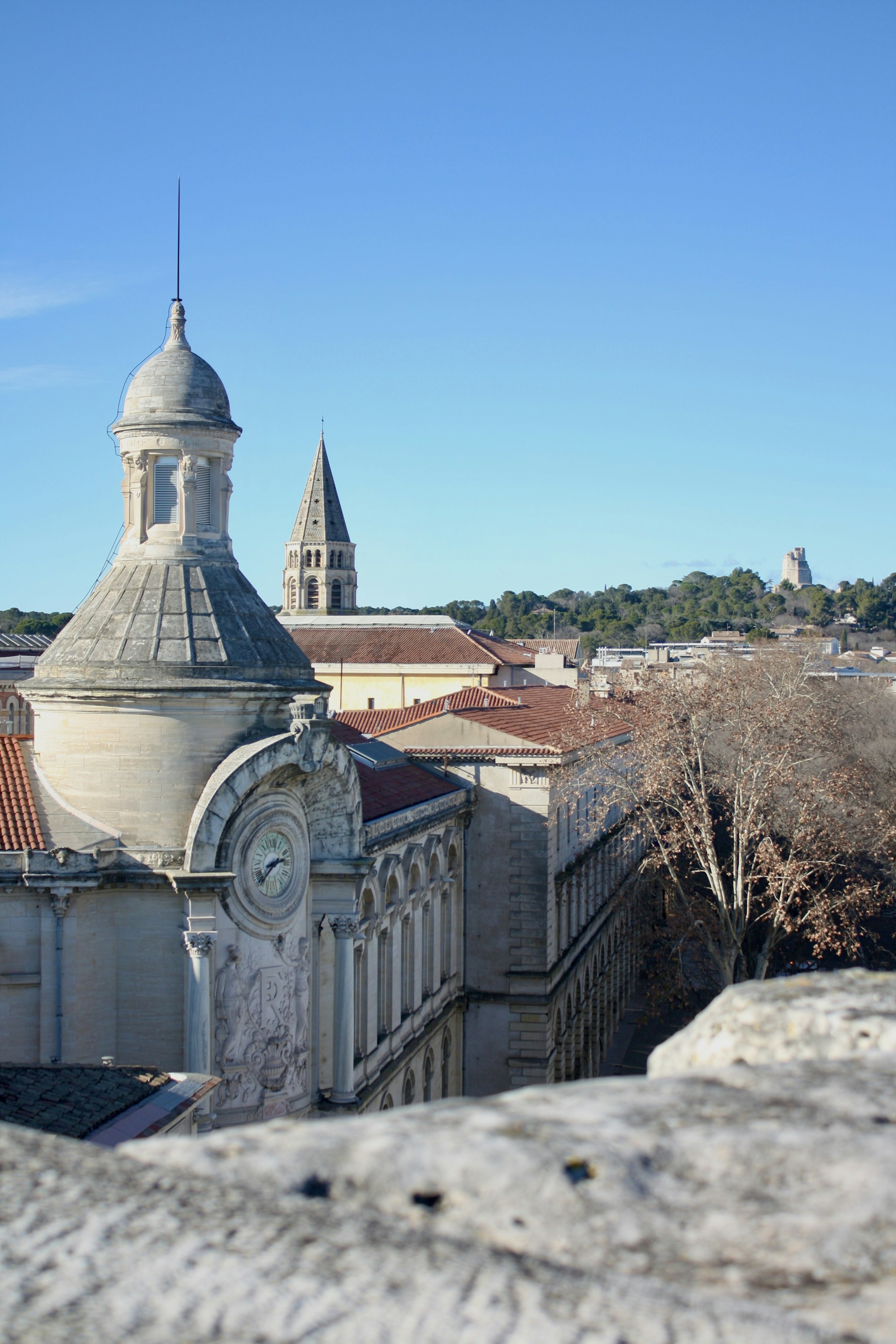 a large building with a clock on the top of it