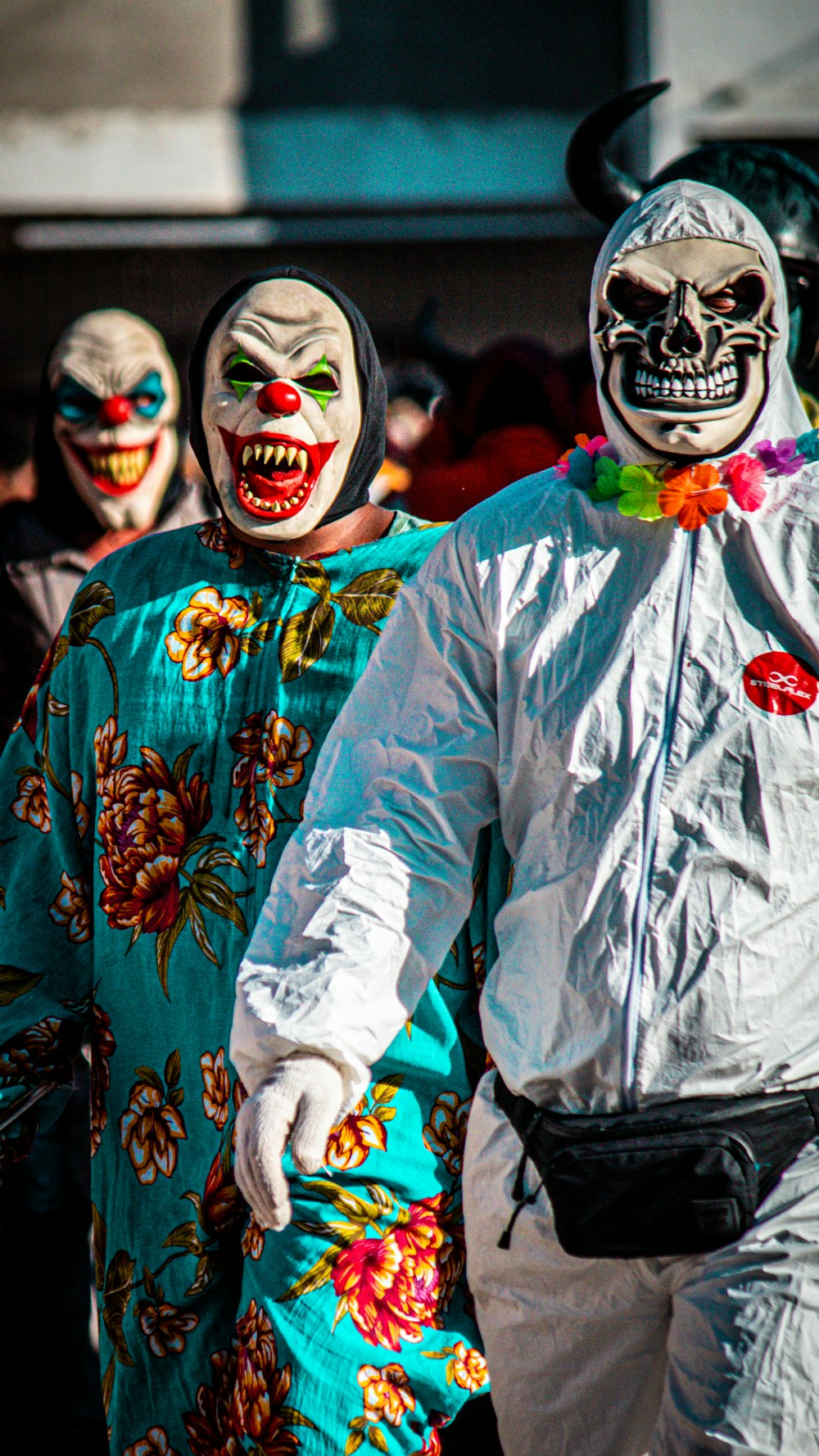 a group of clowns walking down a street