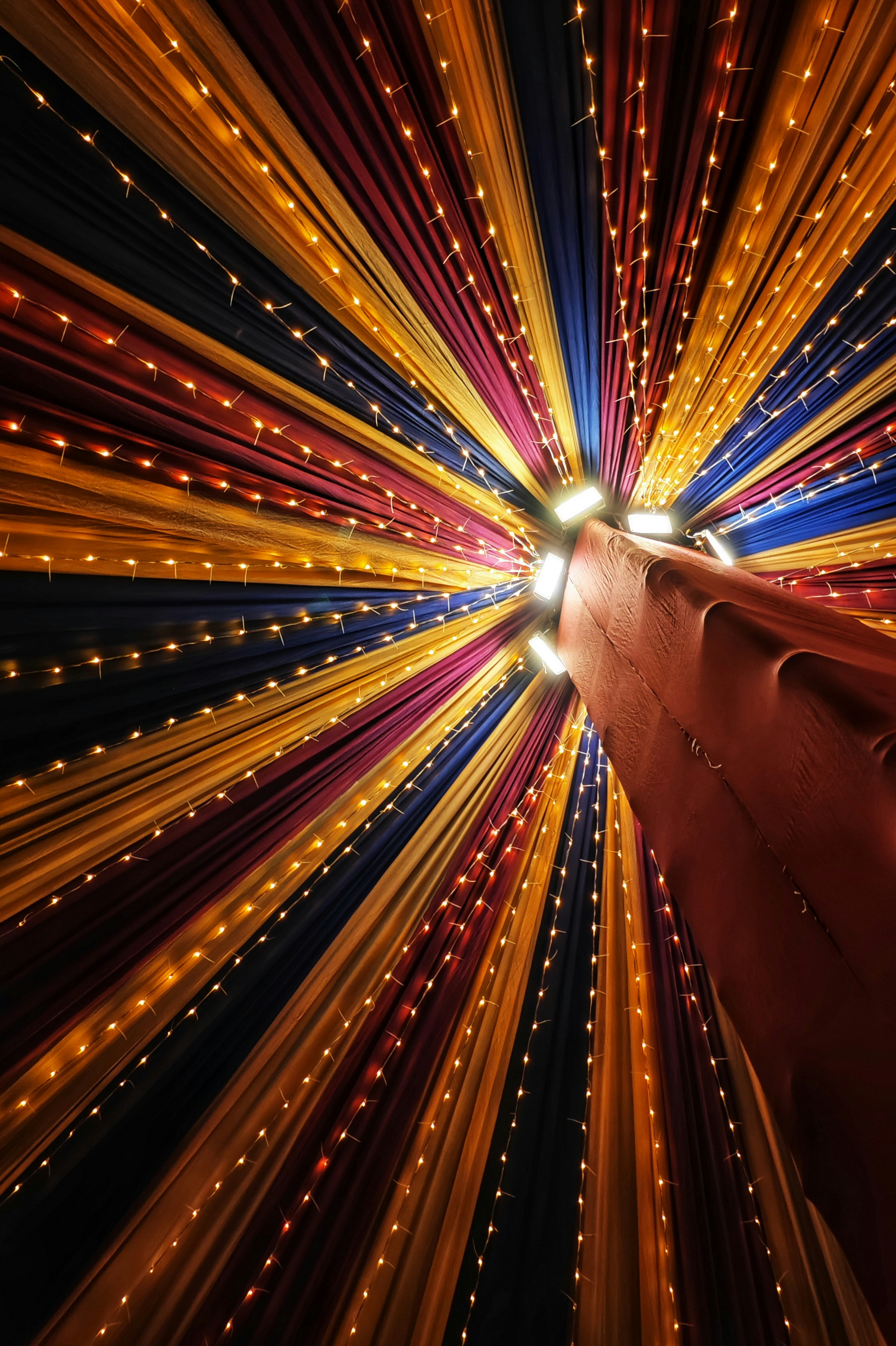 a large boat with a lot of lights on it's side