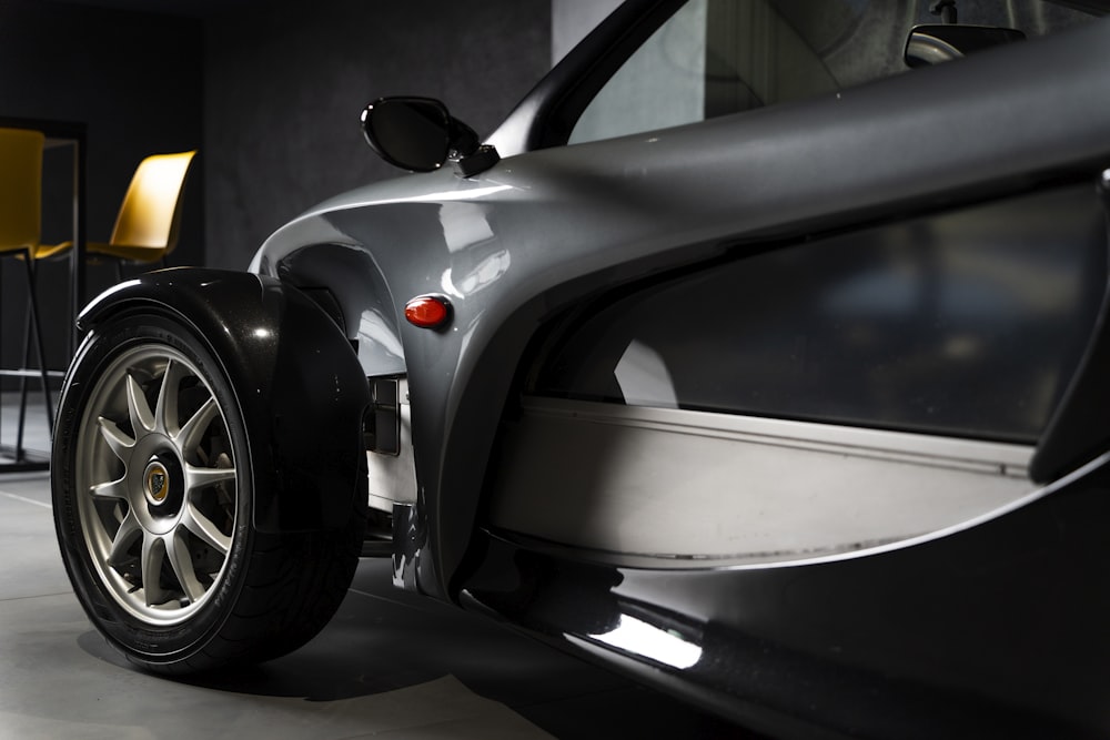 a close up of a car parked in a garage