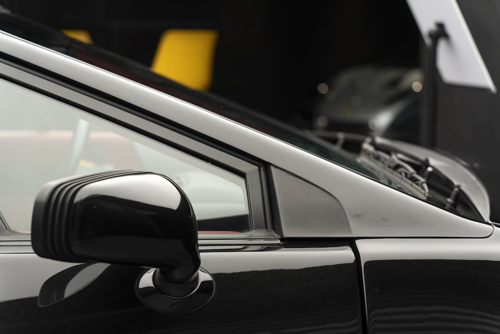 a close up of a car's side view mirror