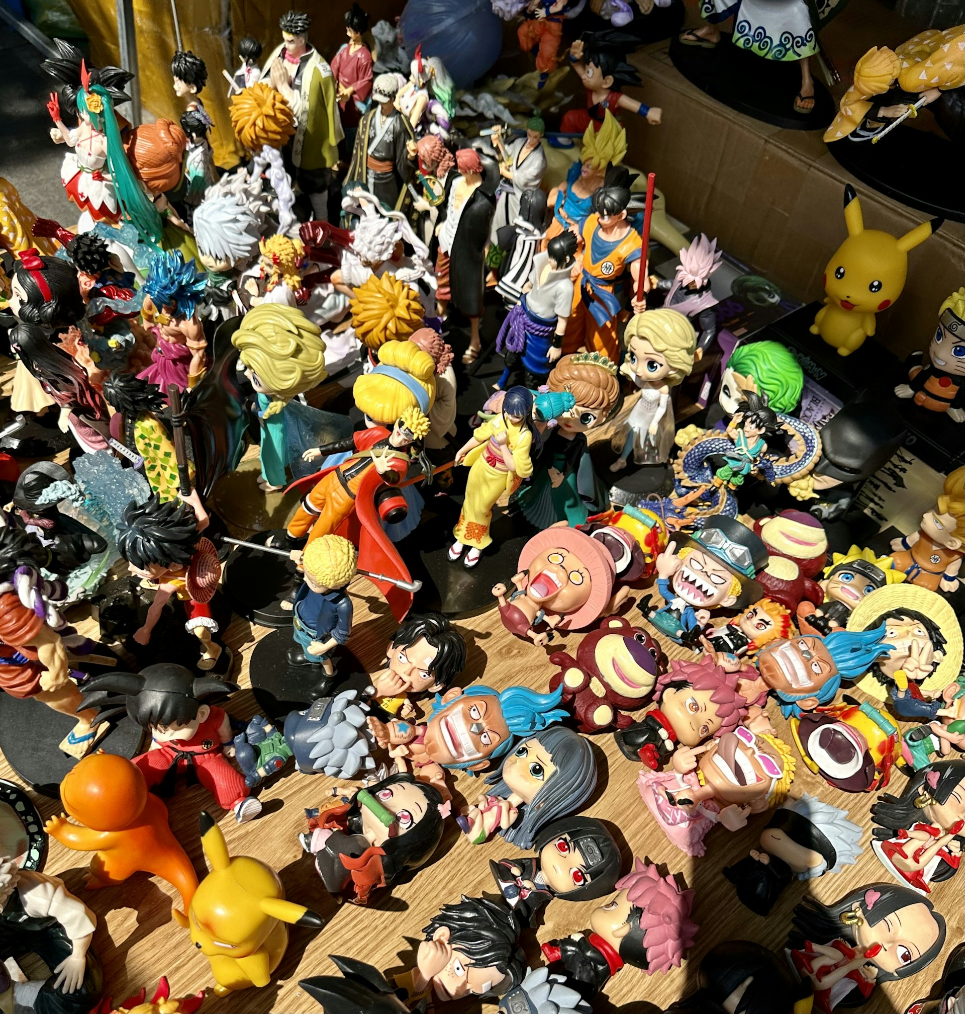 a table topped with lots of toy figurines
