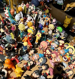 a table topped with lots of toy figurines