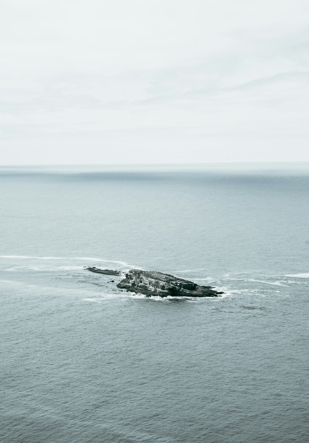 a small island in the middle of the ocean