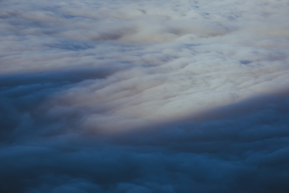 a view of the clouds from an airplane window