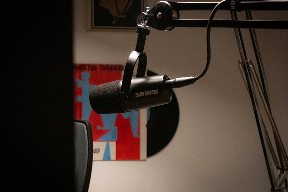 a microphone in front of a mirror in a room