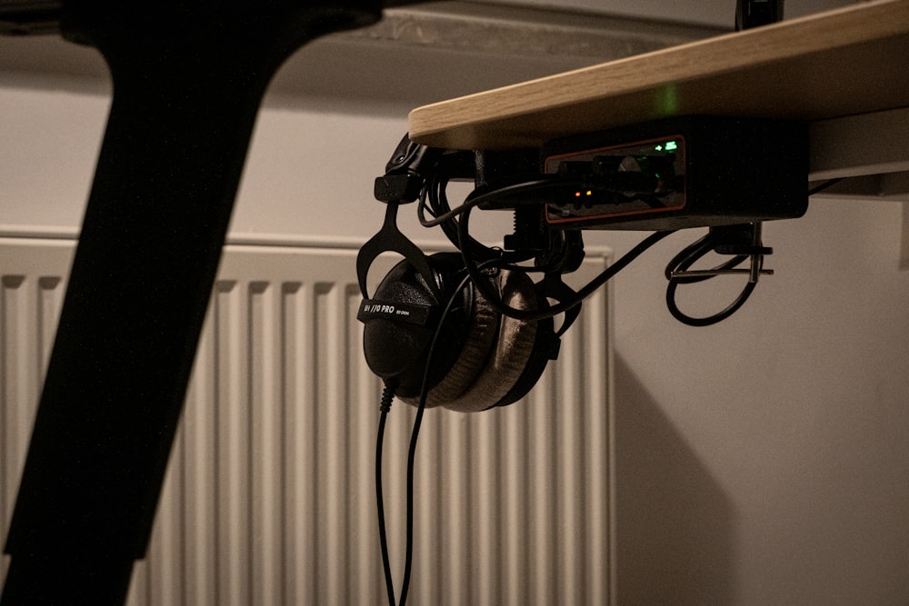 a rack with headphones hanging from it