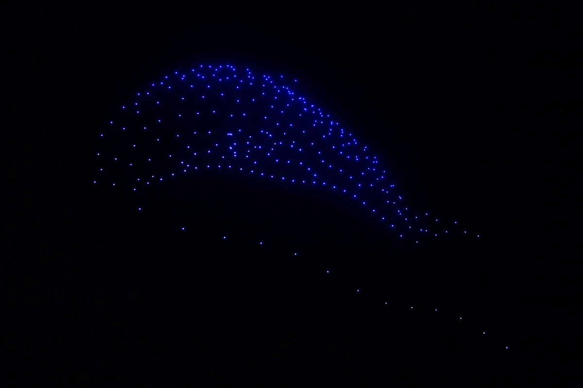 250 drones forming shape in night sky