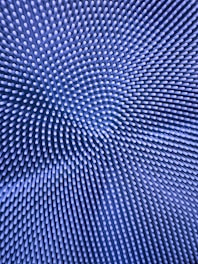 a blue background with a circular pattern