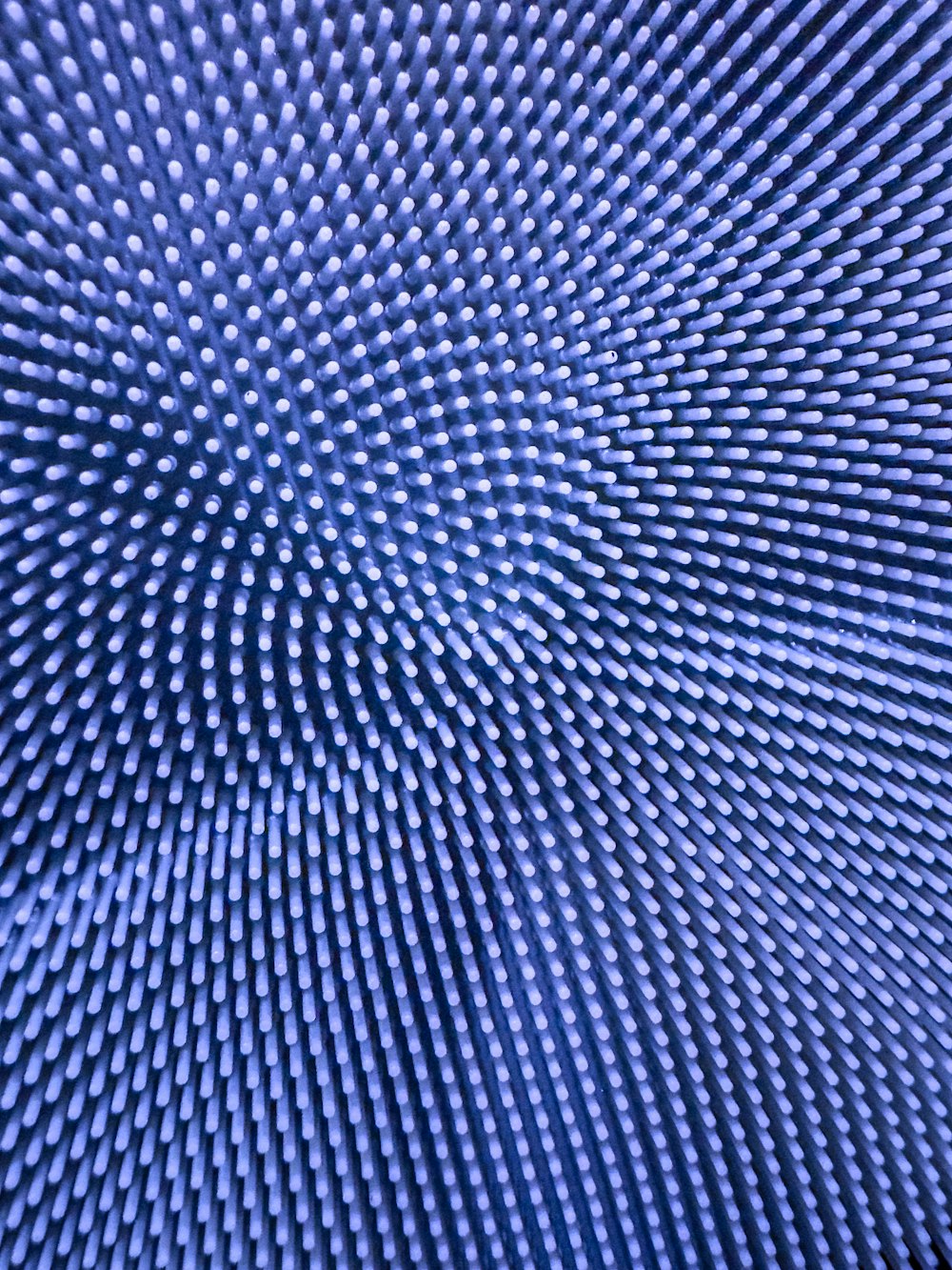 a blue background with a circular pattern