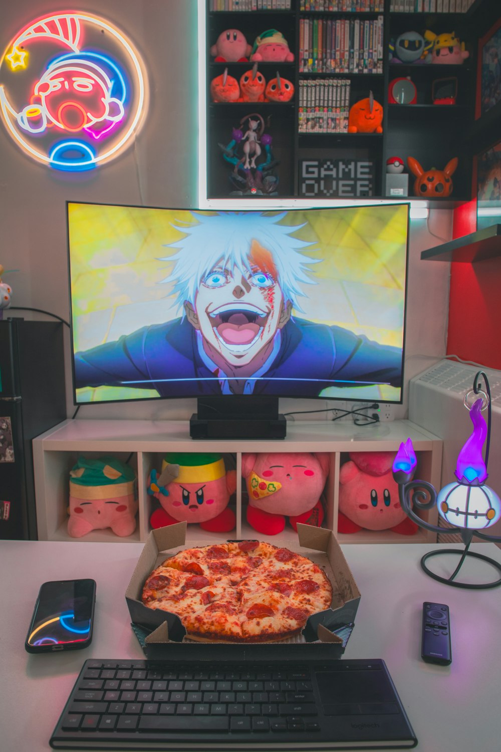 a pizza sitting on top of a table next to a keyboard