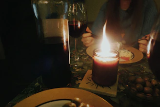 a candlelit dinner display with warm ambience 